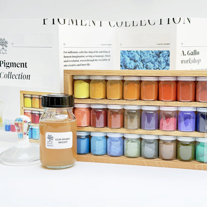 Collection of jars with pigments and a display stand labeled 'Pigment Collection' on a white background.