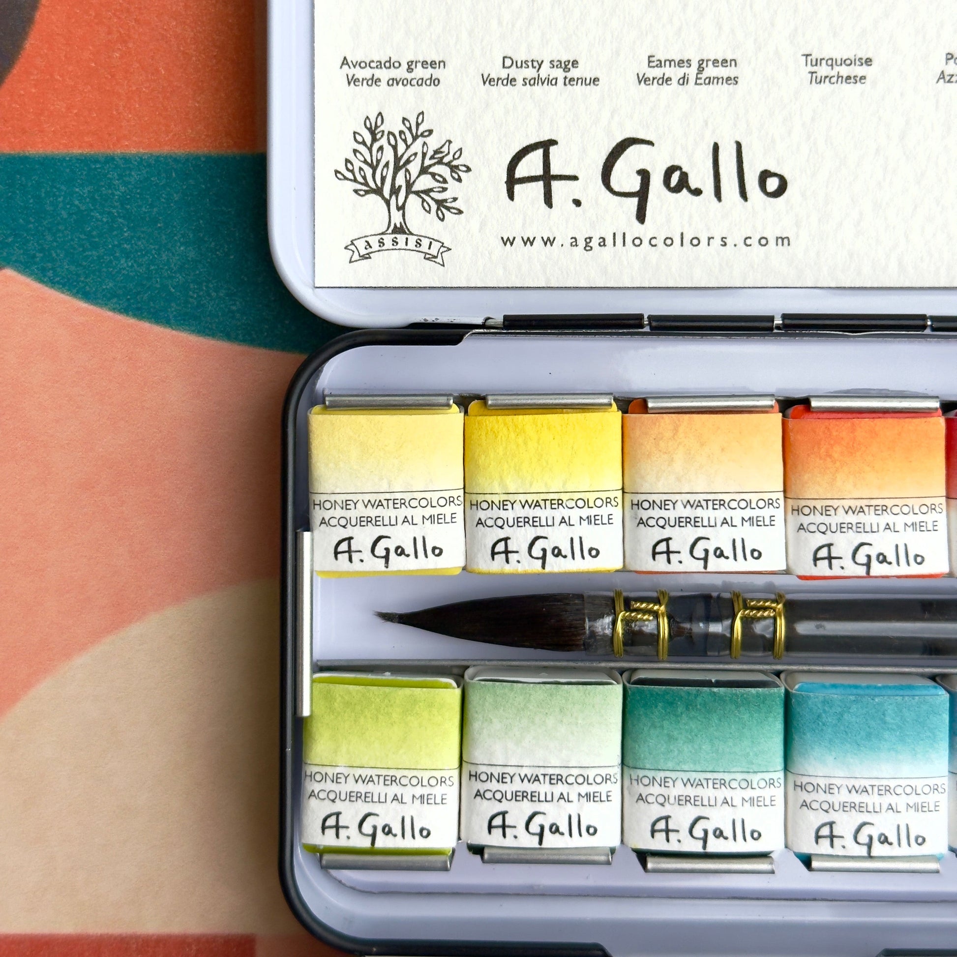 Set of A. Gallo watercolor paints in a tin with a colorful background