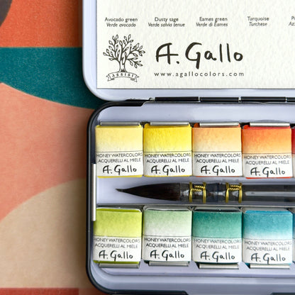 Set of A. Gallo watercolor paints in a tin with a colorful background