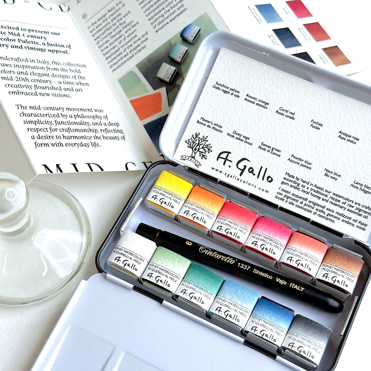 A Gallo watercolor paint set with a white container on a light background